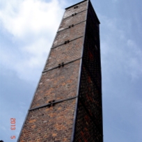 Smokestack rising from the crematorium. Built under the directions of the SS in 1940