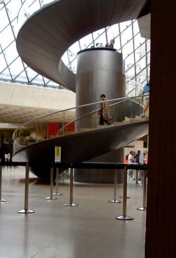An elevator hidden within the spiral staircase allows handicapped visitors access to galleries.